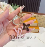 LOUIS VUITTON BAG CHARM AND KEYCHAIN - Image 5