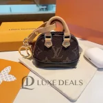 LOUIS VUITTON lv DOG MONOGRAM BAG CHARM - Image 9