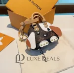 LOUIS VUITTON lv DOG MONOGRAM BAG CHARM - Image 2