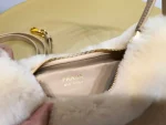 Prada Arqué shearling and leather shoulder bag - Image 9