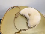 Prada Arqué shearling and leather shoulder bag - Image 10