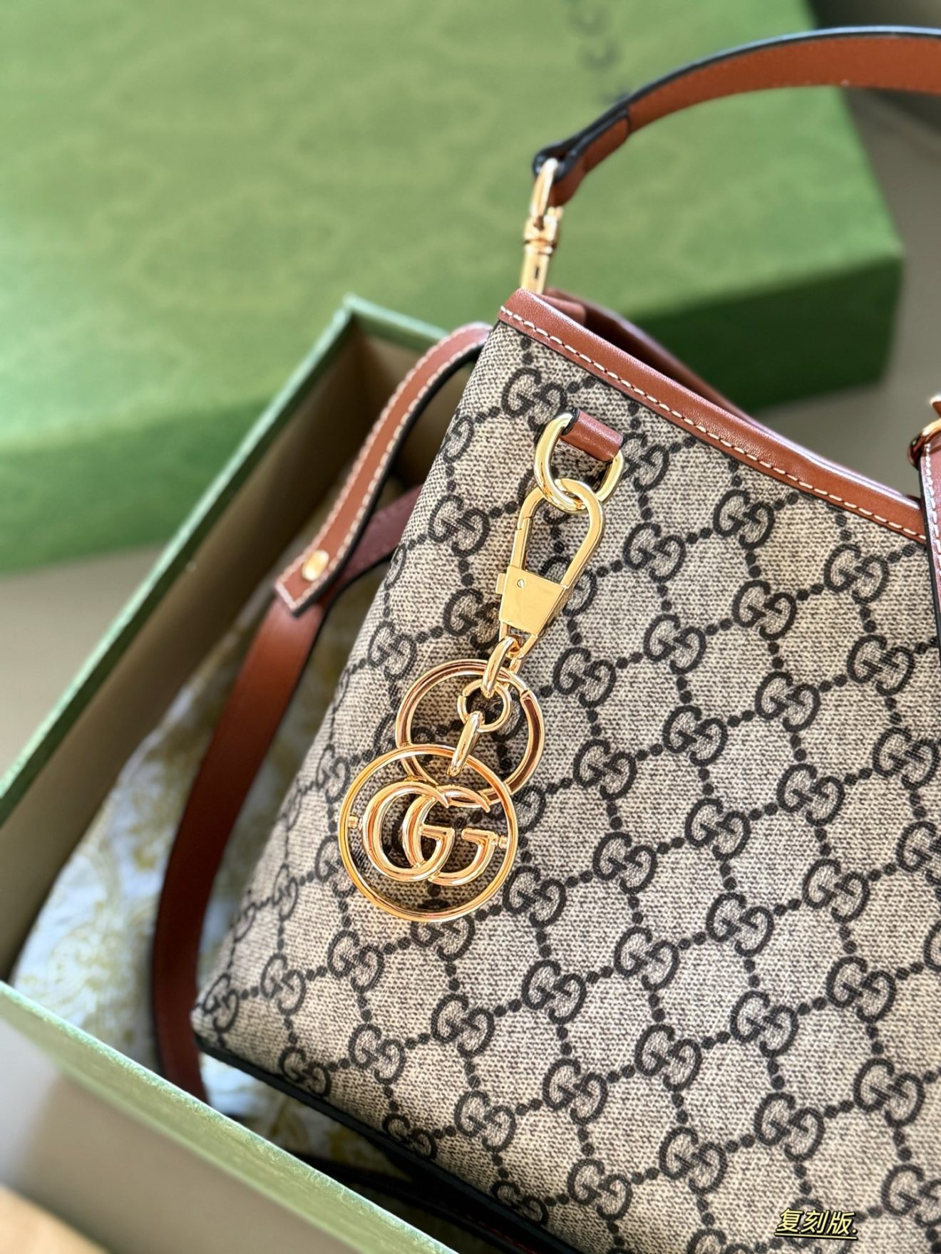 Gucci GG Emblem Bucket Bag size in 20x18cm - Image 3